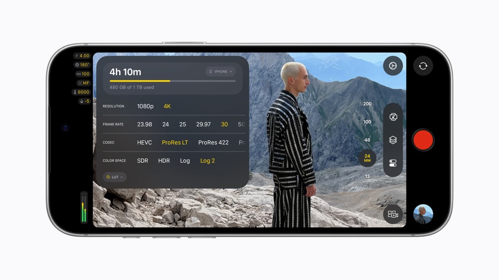 iPhone 18 Pro 上显示 Final Cut Camera 界面:一个人站在山间,旁边是一个格式设置窗口。